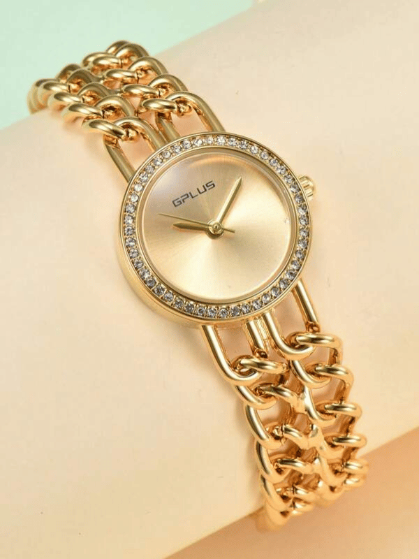 Relógio dourado com strass